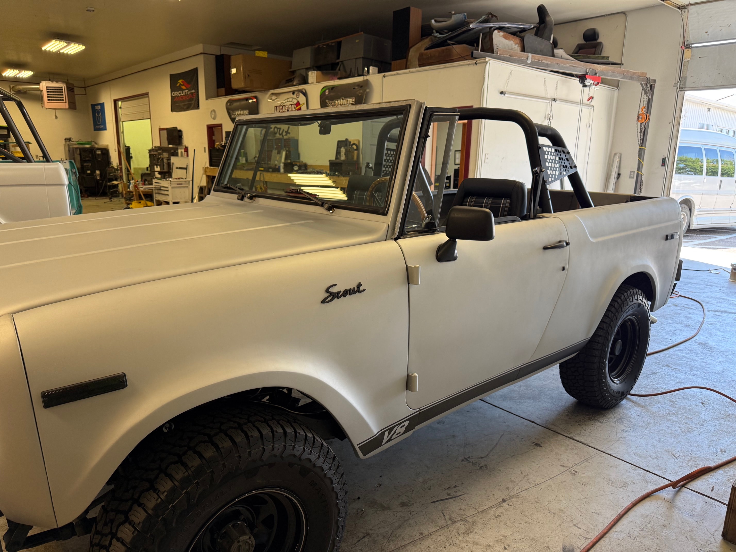 1969 Scout 800 V8 front three-quarter in garage